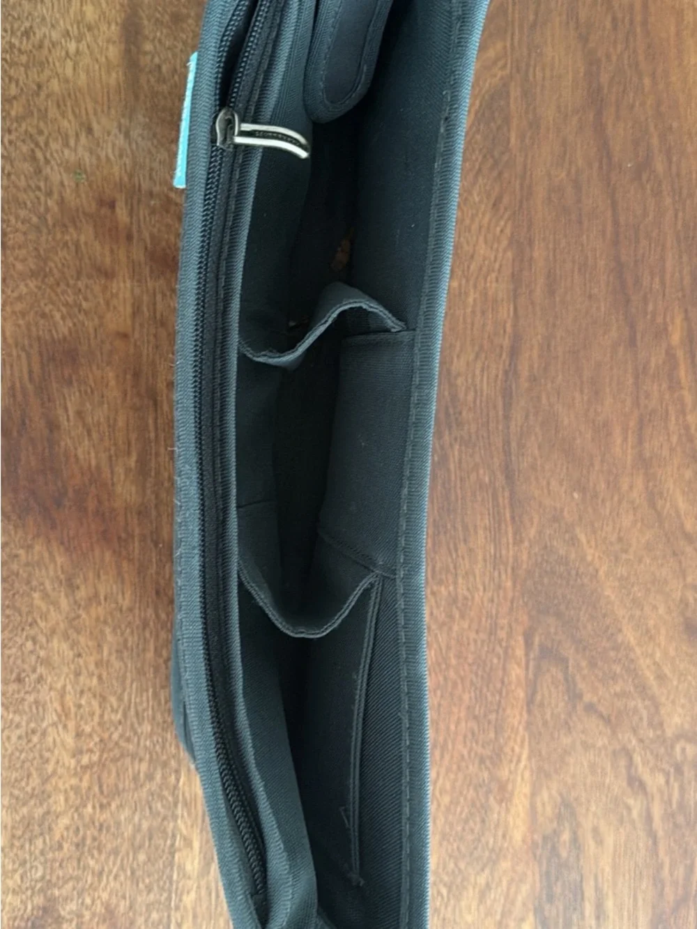 BumGenius Black Kids Neoprene Sleeve with Teal Logo Tag